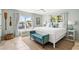 Bright bedroom featuring neutral tones, large windows, and stylish coastal accents at 6250 Holmes Blvd # 63, Holmes Beach, FL 34217