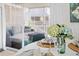 Dining area showcases a table setting with access to the screened-in porch at 6250 Holmes Blvd # 63, Holmes Beach, FL 34217