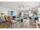 Open-concept living room with plenty of seating and natural light at 6250 Holmes Blvd # 63, Holmes Beach, FL 34217