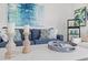Comfortable living room showcases a plush sofa, coastal-themed pillows, and decorative accents at 6250 Holmes Blvd # 63, Holmes Beach, FL 34217
