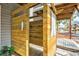 An outdoor shower offers an open-air showering experience with wooded privacy at 6250 Holmes Blvd # 63, Holmes Beach, FL 34217