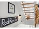 View of the stairway with rope railing, wall decor and steps leading to upper level at 6250 Holmes Blvd # 63, Holmes Beach, FL 34217