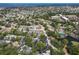 Aerial view of property in established neighborhood with close proximity to community lake and green space at 6402 23Rd Avenue W Dr, Bradenton, FL 34209