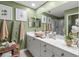 Stylish bathroom featuring a vessel sink, modern fixtures, and elegant decor at 6402 23Rd Avenue W Dr, Bradenton, FL 34209