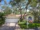 Charming home with a well-manicured lawn, brick driveway, and welcoming curb appeal at 6402 23Rd Avenue W Dr, Bradenton, FL 34209