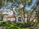 Charming home with well-manicured lawn, mature trees, and inviting curb appeal at 6402 23Rd Avenue W Dr, Bradenton, FL 34209