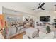 Spacious open-concept living area with a modern kitchen and dining space for entertaining at 6402 23Rd Avenue W Dr, Bradenton, FL 34209