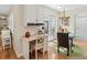 Charming office nook area off the breakfast area with natural light and granite countertop desk at 6402 23Rd Avenue W Dr, Bradenton, FL 34209