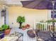 Cozy patio area featuring comfortable furniture, potted plants, and a relaxing atmosphere at 6402 23Rd Avenue W Dr, Bradenton, FL 34209