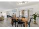 Spacious dining room adjacent to a cozy living area and well-lit bonus room at 6442 Colonial Dr, Sarasota, FL 34231