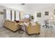 Inviting living room with a modern entertainment center and cozy seating area at 6442 Colonial Dr, Sarasota, FL 34231