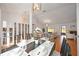 Elegant dining area with modern lighting and decor, seamlessly connected to the adjacent living spaces at 6675 Easton Dr, Sarasota, FL 34238