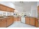 Open-concept kitchen offering granite countertops, plentiful cabinetry, and seamless connectivity to the living areas at 6675 Easton Dr, Sarasota, FL 34238