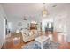 Open-concept living area featuring hardwood floors and contemporary decor at 6675 Easton Dr, Sarasota, FL 34238