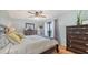 Light and airy bedroom with a ceiling fan and sliding glass doors to the exterior at 6836 Midnight Pass Rd # 6836, Sarasota, FL 34242