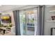 Cozy screened-in patio with comfortable seating and views of the surrounding community at 6836 Midnight Pass Rd # 6836, Sarasota, FL 34242