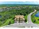 Aerial view of the property showcasing its prime location near lush greenery at 6907 Grand Estuary Trl # 104, Bradenton, FL 34212