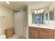 Bathroom features a shower, vanity, and ample counter space at 6907 Grand Estuary Trl # 104, Bradenton, FL 34212