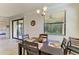 Charming dining area with natural light and access to the lanai at 6907 Grand Estuary Trl # 104, Bradenton, FL 34212