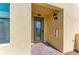 Charming front entrance with a decorative door and brick-paved landing, providing a warm welcome at 6907 Grand Estuary Trl # 104, Bradenton, FL 34212