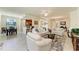Spacious living area with an open layout that connects to dining and kitchen, perfect for entertaining at 6907 Grand Estuary Trl # 104, Bradenton, FL 34212