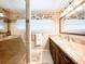 The bathroom features a marble vanity, an ornate mirror, and a walk-in glass shower at 708 32Nd W St, Bradenton, FL 34205