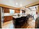 Spacious kitchen with a large center island, granite countertops, wooden cabinets, and stainless steel appliances at 708 32Nd W St, Bradenton, FL 34205