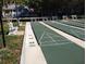 Community shuffleboard courts with benches, providing an enjoyable outdoor activity space at 7201 29Th Avenue W Dr # 306, Bradenton, FL 34209