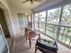 Inviting sunroom with views of the well-maintained yard offers relaxation and enjoyment of the outdoors at 7201 29Th Avenue W Dr # 306, Bradenton, FL 34209