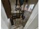 Basement with bar and stone walls at 7732 N Mobley Rd, Odessa, FL 33556