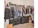 Walk-in closet with shelving, hanging rods, and drawer units for optimal storage at 8541 Whispering St, Sarasota, FL 34240