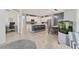 Spacious kitchen with modern appliances, a breakfast bar, and seamless flow to other living areas at 8541 Whispering St, Sarasota, FL 34240