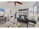 Inviting living room with comfortable seating, a sliding door to the outside, and stylish decor at 8541 Whispering St, Sarasota, FL 34240