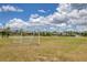 A large, grassy soccer field with goals on a clear day is a great place to get in shape and enjoy the outdoors at 8541 Whispering St, Sarasota, FL 34240