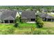 Aerial view of the home showing the backyard with patio and fence at 10708 52Nd E Ct, Parrish, FL 34219