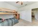 Comfortable bedroom featuring wood bunk beds and closet at 10708 52Nd E Ct, Parrish, FL 34219