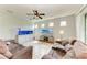 Spacious living room with neutral walls, tile floors, and a ceiling fan at 10708 52Nd E Ct, Parrish, FL 34219