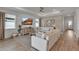 Bright living room featuring neutral tones, large windows, and comfortable seating for relaxed living at 10724 Spring Tide Way, Parrish, FL 34219