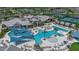 An aerial view of the pool and lounge area showing the resort style pool and the surrounding community at 10724 Spring Tide Way, Parrish, FL 34219