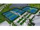 Tennis courts aerial view with palm tree-lined walkway, perfect for active community members at 10724 Spring Tide Way, Parrish, FL 34219