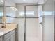 Modern bathroom featuring a glass enclosed shower and white subway tile with a mosaic accent border at 11015 High Noon Trl, Parrish, FL 34219