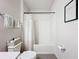 Shower and toilet with towel rack in a clean, well lit bathroom at 11015 High Noon Trl, Parrish, FL 34219