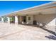 Common patio area offers comfortable seating with ceiling fans for shade at 11015 High Noon Trl, Parrish, FL 34219