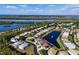 Aerial view of property located on the pond with waterfront views of the bays at 11367 Perico Isle Cir, Bradenton, FL 34209