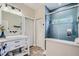 Well-lit bathroom with a stylish vanity, decorative vessel sink, and a modern glass-enclosed shower at 11367 Perico Isle Cir, Bradenton, FL 34209