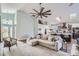 Comfortable living room with a large sectional sofa and neutral color palette at 11367 Perico Isle Cir, Bradenton, FL 34209