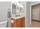 Bathroom with marble countertop vanity, neutral wall color, and tiled floor at 11455 52Nd E Ct, Parrish, FL 34219