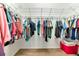Organized walk-in closet featuring metal racking and plenty of space for clothing and accessories at 11455 52Nd E Ct, Parrish, FL 34219