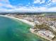 Breathtaking aerial view showcasing the city's beautiful beach and oceanfront residences and commercial properties at 116 Vista Hermosa Cir # 204C, Sarasota, FL 34242