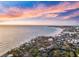Stunning aerial view of the coastline and residences with incredible scenery, showcasing a vibrant and desirable community at 116 Vista Hermosa Cir # 204C, Sarasota, FL 34242